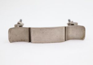 Pair of brushed nickel brass drawer pulls with a curved bridge shape, shown front view with surface wear visible on the pair.