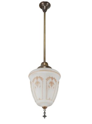Neoclassical pendant light with a white milk glass shade, antique brass stem, and ornate finial.