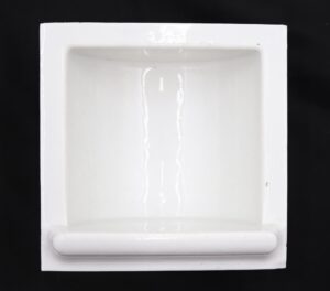 White square recessed soap dish with a shallow basin and rounded front lip, shown front on with slight surface wear.