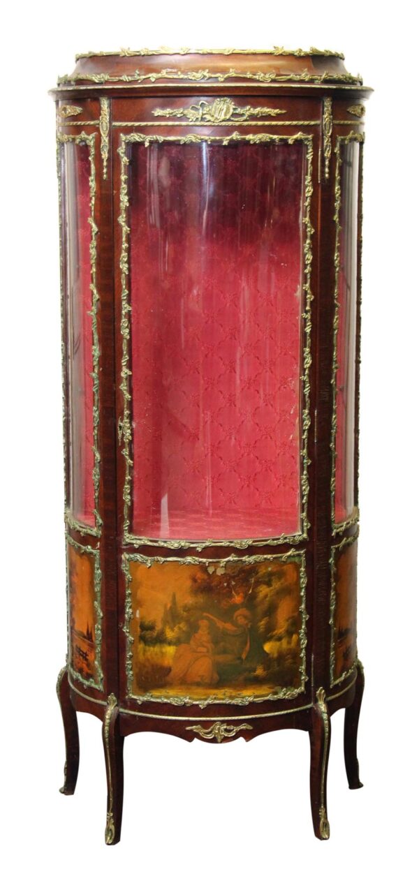 Curved curio cabinet with clear glass panels, a red upholstered interior, gilt trim, and painted countryside scenes on the base.