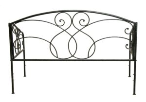 Black steel twin daybed frame with curved headboard scrollwork and side panels.
