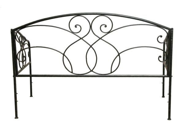 Black steel twin daybed frame with curved headboard scrollwork and side panels.