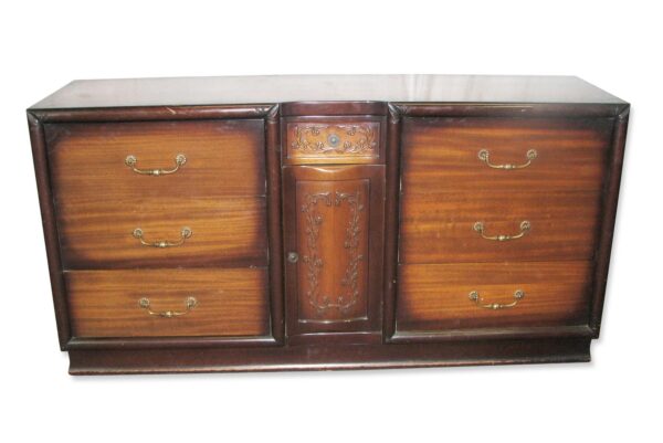 Traditional six-foot wooden dresser with six drawers and a center cabinet, shown front view with dark wood tone and antique brass hardware.
