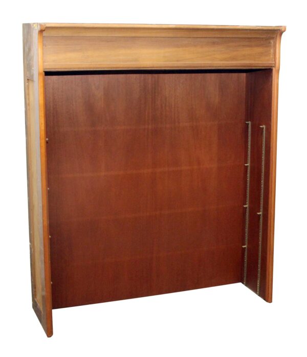 Commercial wooden cabinet hutch shown open from the front, with shelf mounting hardware attached along both sides and a medium wood tone finish.