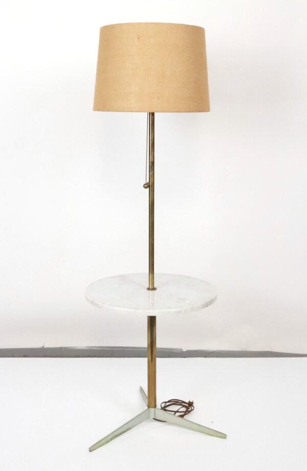 Mid century table floor lamp with a burlap shade, pull chain, round tray, and tripod base.