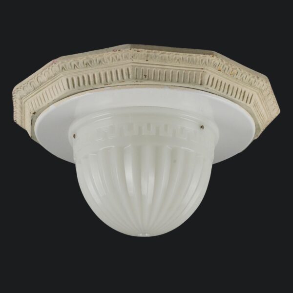 Neoclassical flush mount fixture with a molded plaster fitter base, white reflection dish, and fluted milk glass bowl shown from below.