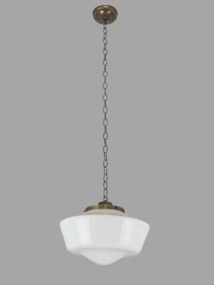 Schoolhouse pendant light with a white milk glass globe and antique brass chain and canopy.