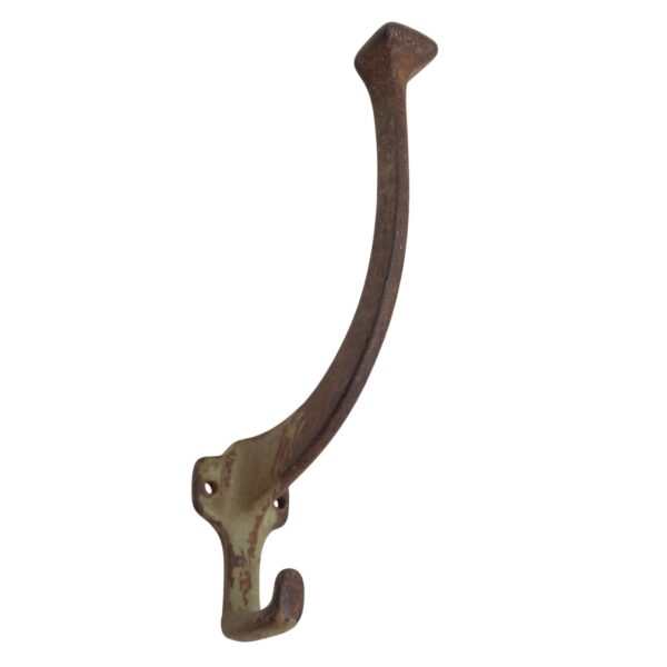 Vintage cast iron wall hook with an elongated arm, a curved lower hook, and two mounting holes, shown with a distressed black finish and surface wear.