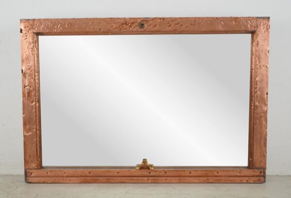 Copper window frame mirror with a polished finish and a mounted wire at the bottom center.