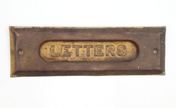 Vintage brass mail slot cover plate with LETTERS cutout, shown front view with two mounting holes and surface wear.