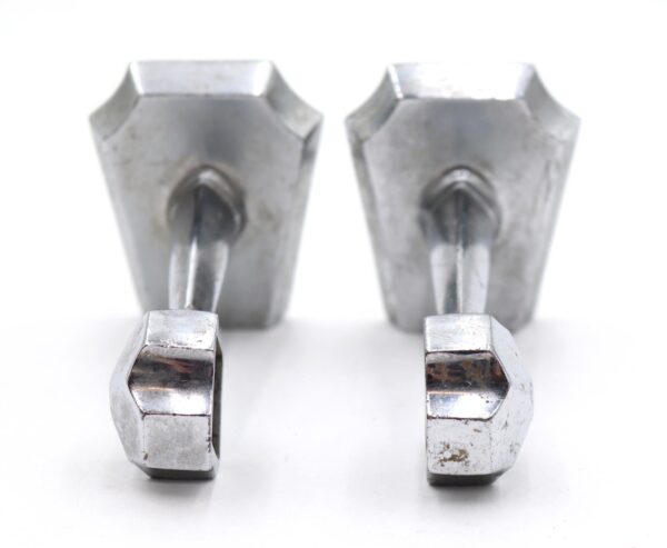 Pair of mid century towel bar brackets in nickel finish, shown as a matching pair with mounting screws visible and light surface wear.