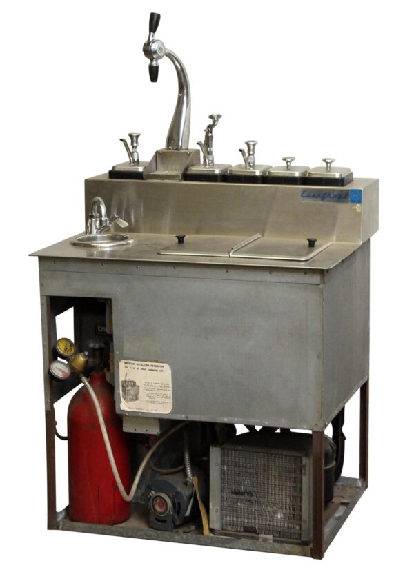 Vintage ice cream and soda fountain machine with a draft arm, five labeled lids, and a CO2 tank visible underneath.