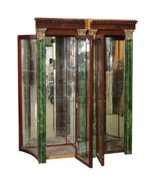Pair of neoclassical display cabinets with glass doors, faux malachite-style pillars, and a curved front, shown together with both cabinets open.