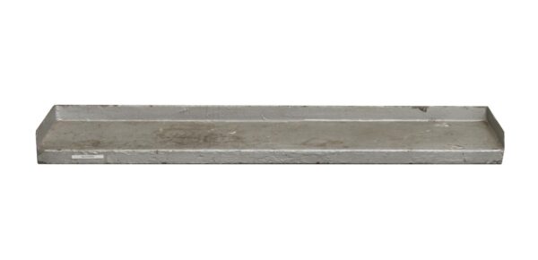 A reclaimed metal shelf piece with side and back retaining lips, shown in a single long view with surface wear visible along the top and front edges.