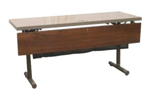 Flip-top conference table with a dark wood-tone top, steel base, and a centered connectivity box cover.