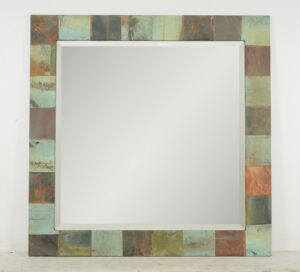 Square wall mirror with a beveled center and a handcrafted patchwork copper frame.