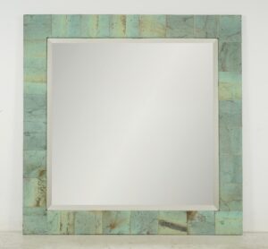 Square wall mirror with a beveled center and a handcrafted patchwork frame in verdigris copper panels.