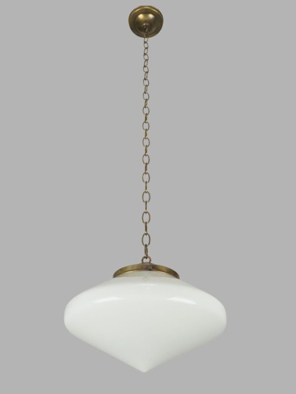 Art Deco pendant light with a white milk glass globe and antique brass chain.