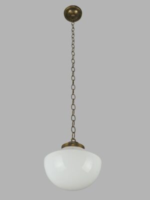 Schoolhouse pendant light with an antique brass chain fitter and a white milk glass globe.