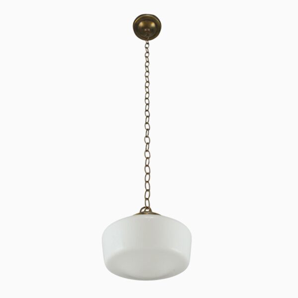 Schoolhouse pendant light with a milk glass globe and antique brass chain fitter.