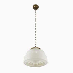 Art Deco pendant light with a frosted glass globe and antique brass chain.