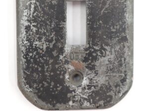 Distressed black steel toggle switch cover wall plate with a single rectangular opening and one screw hole visible.
