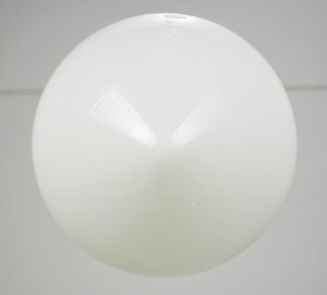 Milk glass pendant light globe shown in close-up with a round white shade and glossy surface.