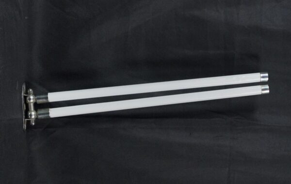 Double-arm wall-mounted towel rack with white milk glass arms and a nickel-plated brass bracket.