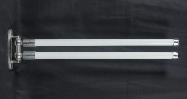 Mid century double arm towel rack with a nickel bracket and two white milk glass arms.