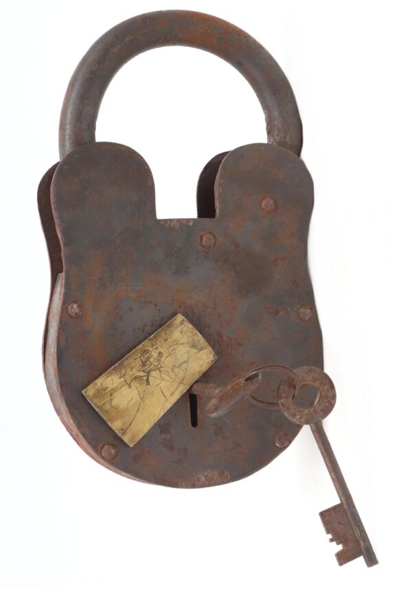 Large antique steel padlock with a cast iron shackle, one brass draft cover, and two keys attached.
