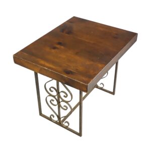 Side table with a dark wood top and wrought iron base featuring heart and scroll motifs, shown in a three-quarter view with visible wear on one tabletop corner.