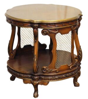 Vintage French round side table with two tiers, carved wood frame, and wire mesh panels in a dark wood tone with gold trim.
