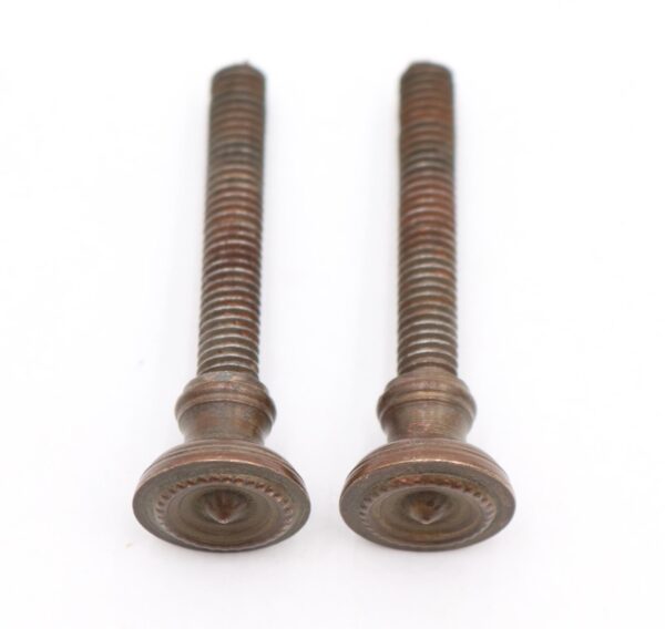 Pair of traditional mirror screws shown as two antique brass fasteners with threaded shafts and round knobs, viewed from the front on a plain white background.