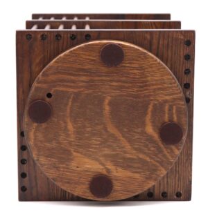 Desktop bookcase on a swivel base, shown from the front with a round rotating base and visible surface wear.