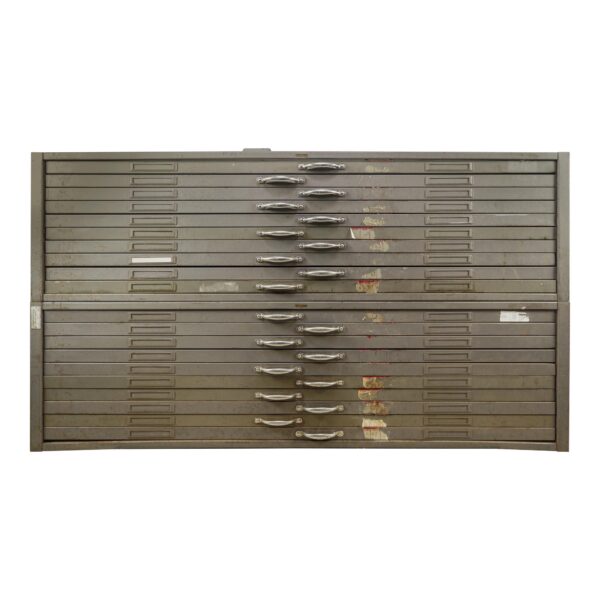 Gray steel flat file cabinet with twenty drawers, shown front on with pull handles and drawer label slots, and visible surface wear and bent lower edge.