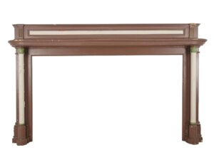 Colonial Revival wood mantel with pilasters, painted in brown, white, and green, shown front view with visible wear and chipped paint.