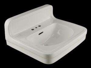 White ceramic wall sink with backsplash and a half-moon basin, shown in a three-quarter view with three faucet holes and a side drain opening.